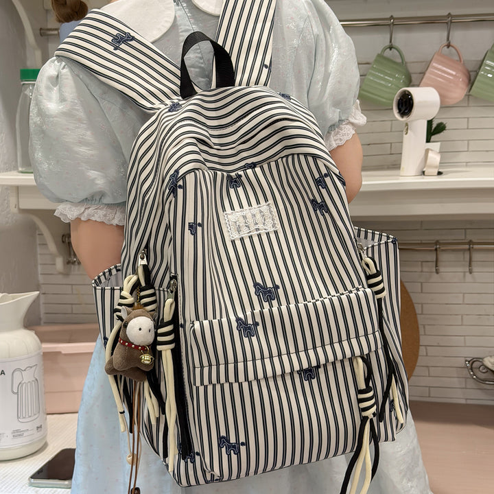 Playful Animal-Themed Striped Backpack Bowlift