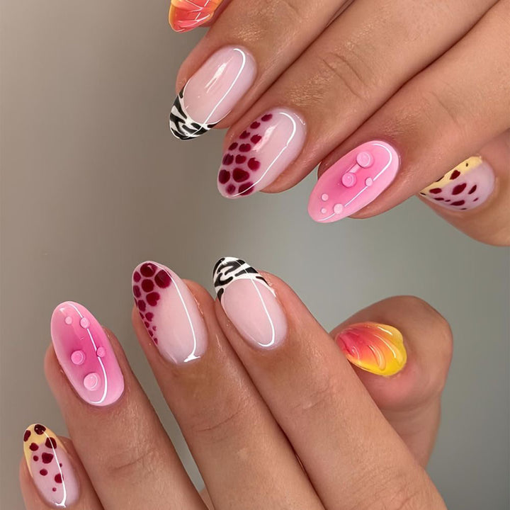 Creative artificial nails with floral design and glitter accents Bowlift