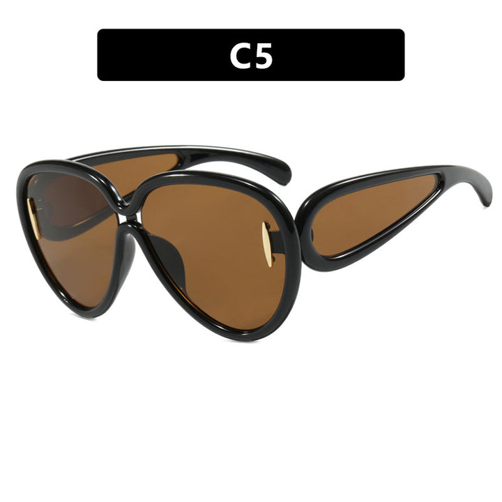 Women extravagant sunglasses in creative design Bowlift
