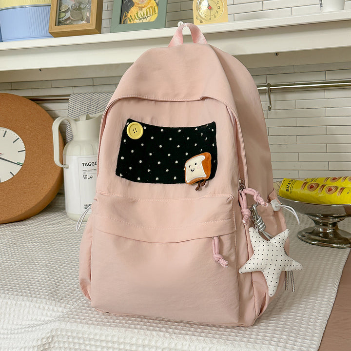 Playful Cartoon-Themed Backpack Bowlift