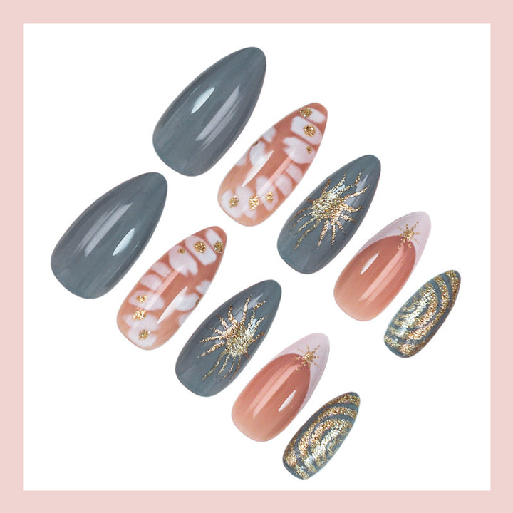Nail art set with elegant gold accents and creative design Bowlift