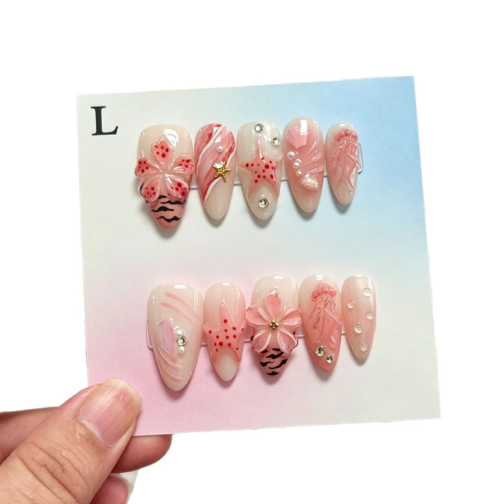 Decorative Press-On Nail Art Set Featuring Floral and Oceanic Designs