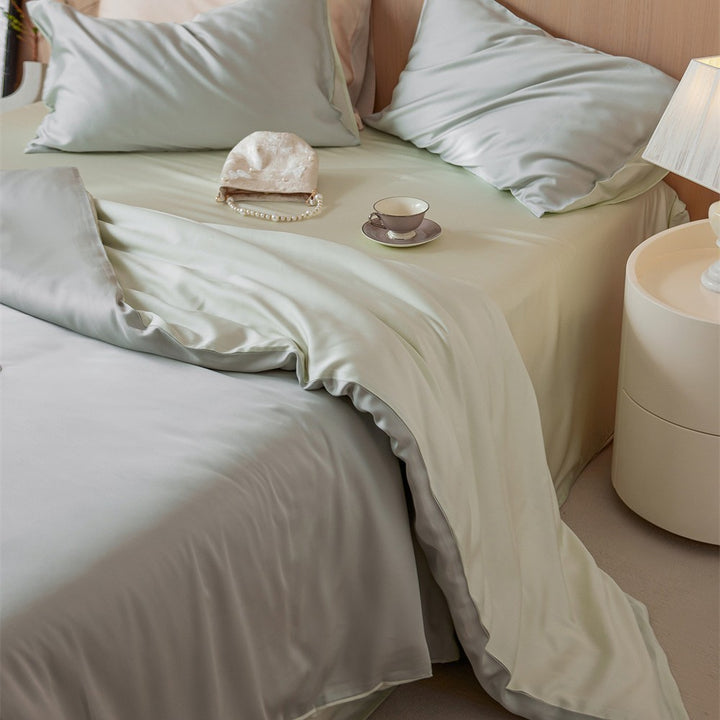 Luxurious cotton satin bedding set with a silky-matte feel, reversible function, and fine piping