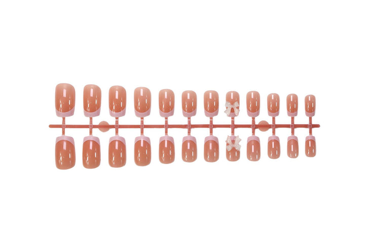 Artificial Nail Set with Romantic Bows and French Tip Bowlift