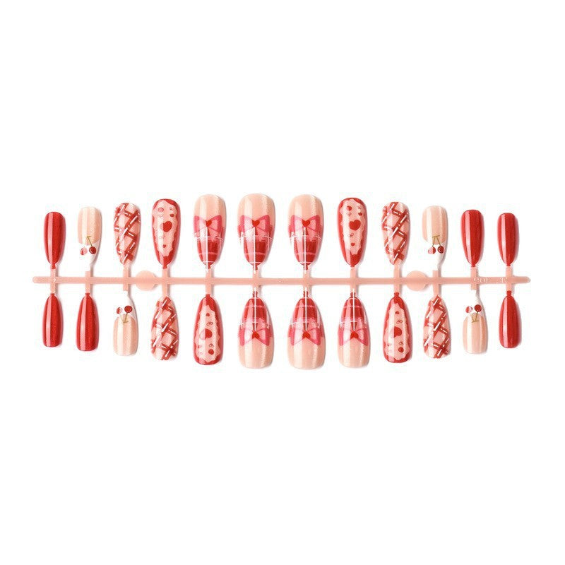 Artificial nail set with playful heart and cherry motifs Bowlift