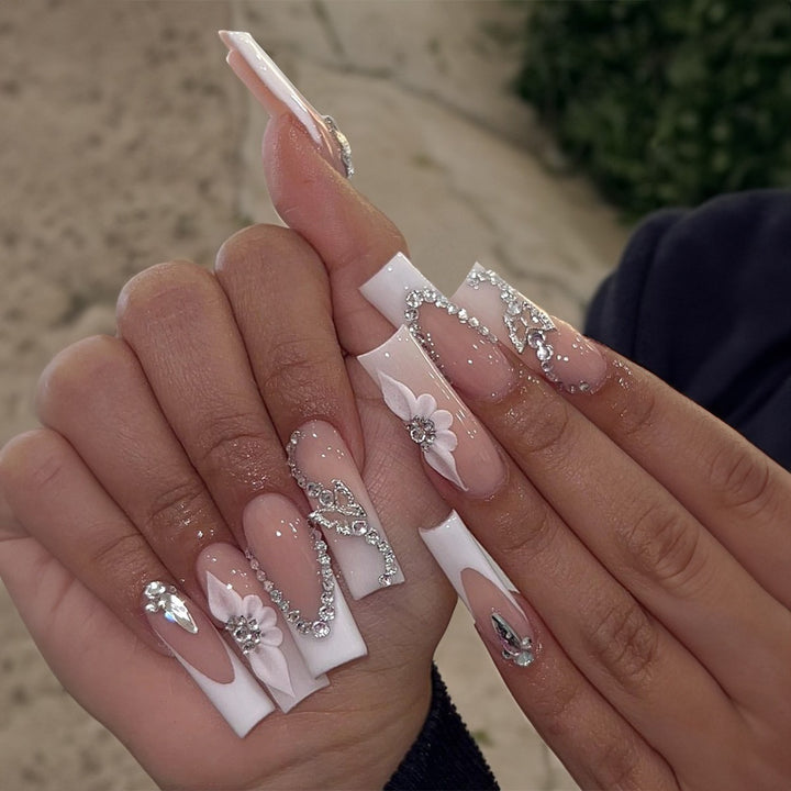 Glamorous artificial nail set with sparkling rhinestones and cross decorations Bowlift