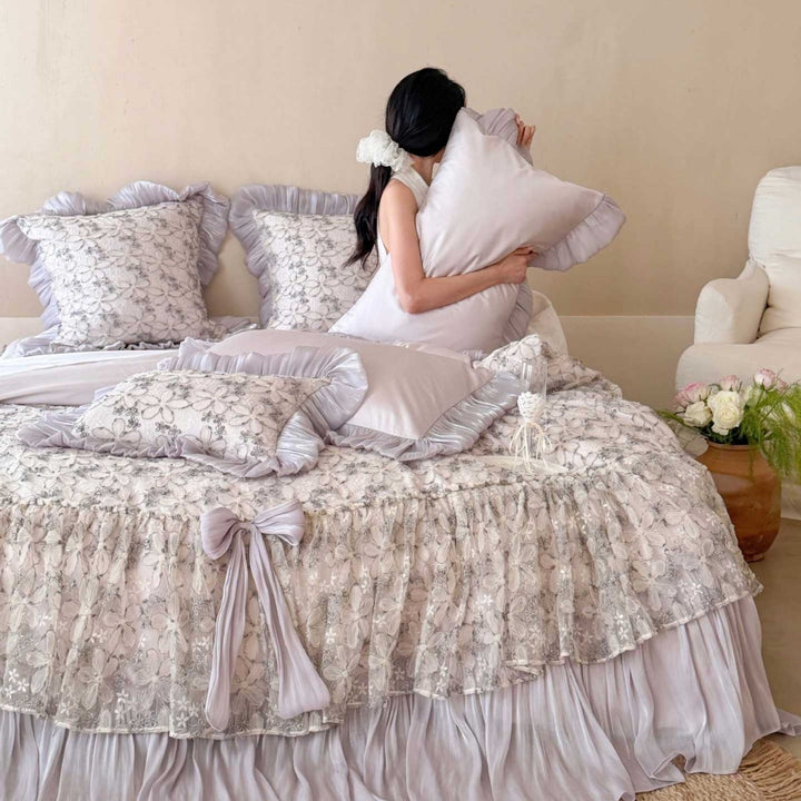 Romantic satin bedding set with ruffles and lace bedspread