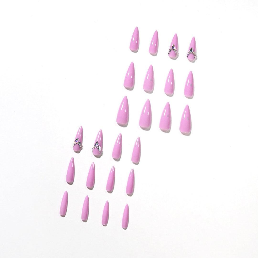 Glamorous stiletto nails with rhinestone decoration Bowlift