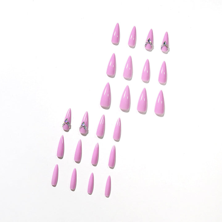 Glamorous stiletto nails with rhinestone decoration Bowlift