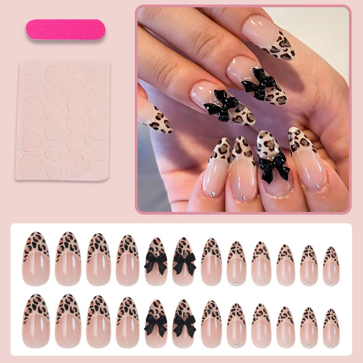 Animal-themed artificial nail set with elegant bows Bowlift