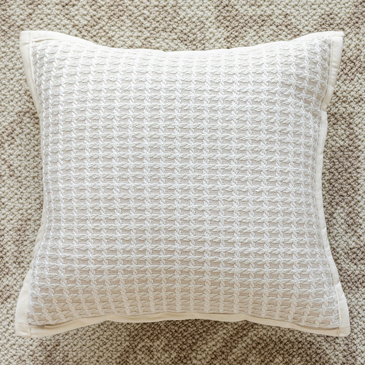 Cozy textured cushion with fringes