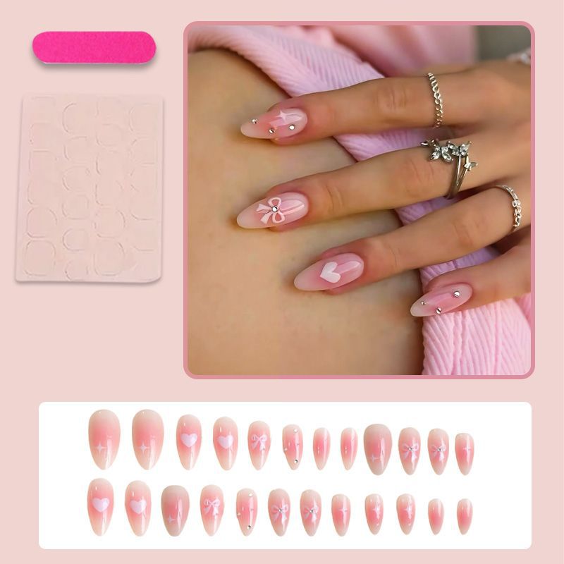 Artificial nail set with delicate bow embellishments Bowlift