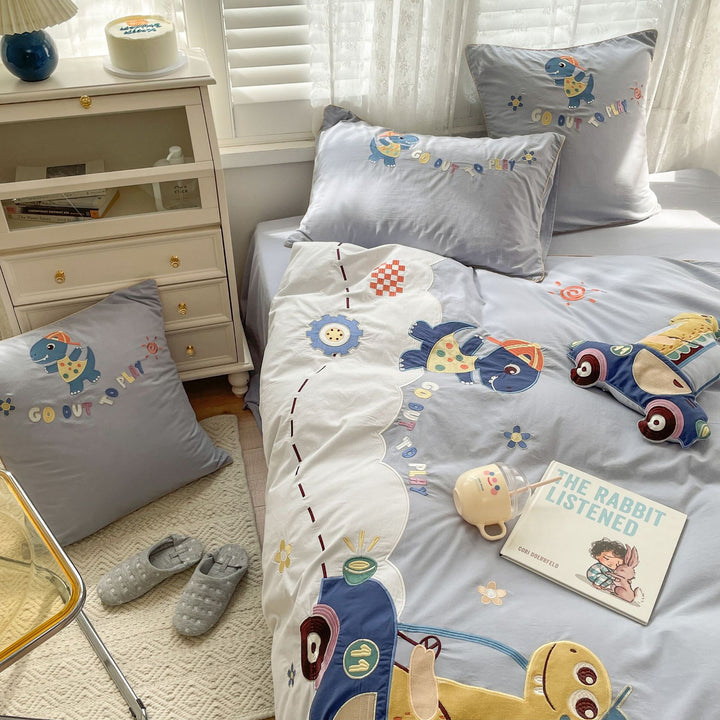 Children's bedding set with embroidered dinosaur and car appliqués Bowlift
