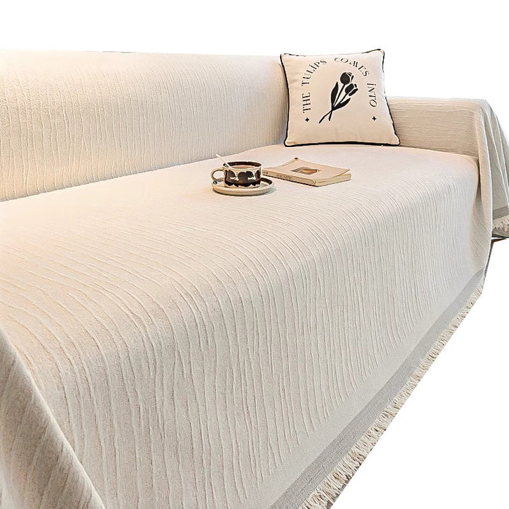 Quilted Textured Sofa Slipcover with Decorative Fringe Bowlift