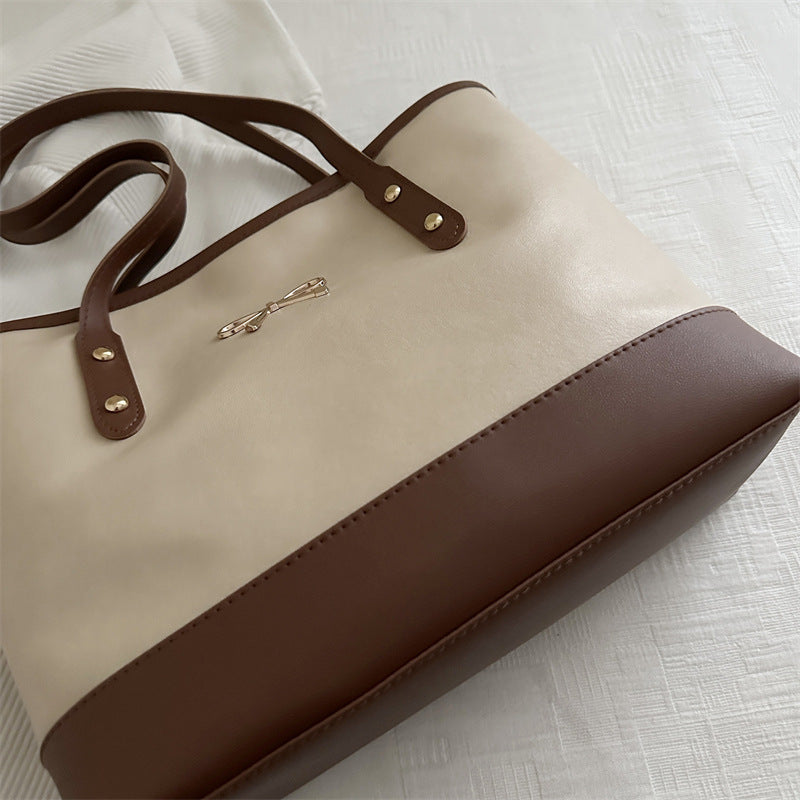 Elegant Faux Leather Tote Bag with Accent Bow