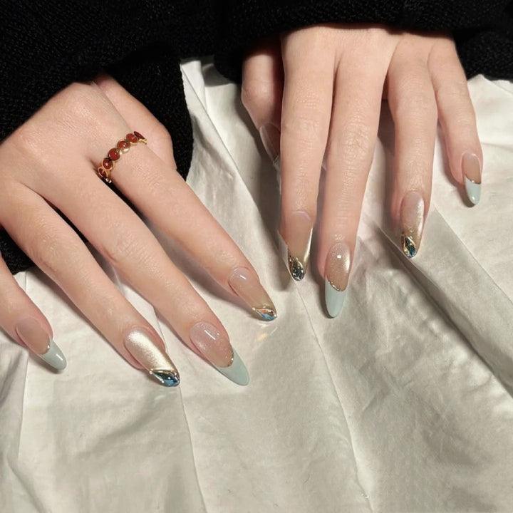 Artistic Press-On Nail Extensions with Floral Embellishments Bowlift