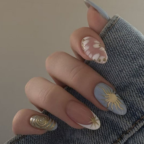 Nail art set with elegant gold accents and creative design Bowlift