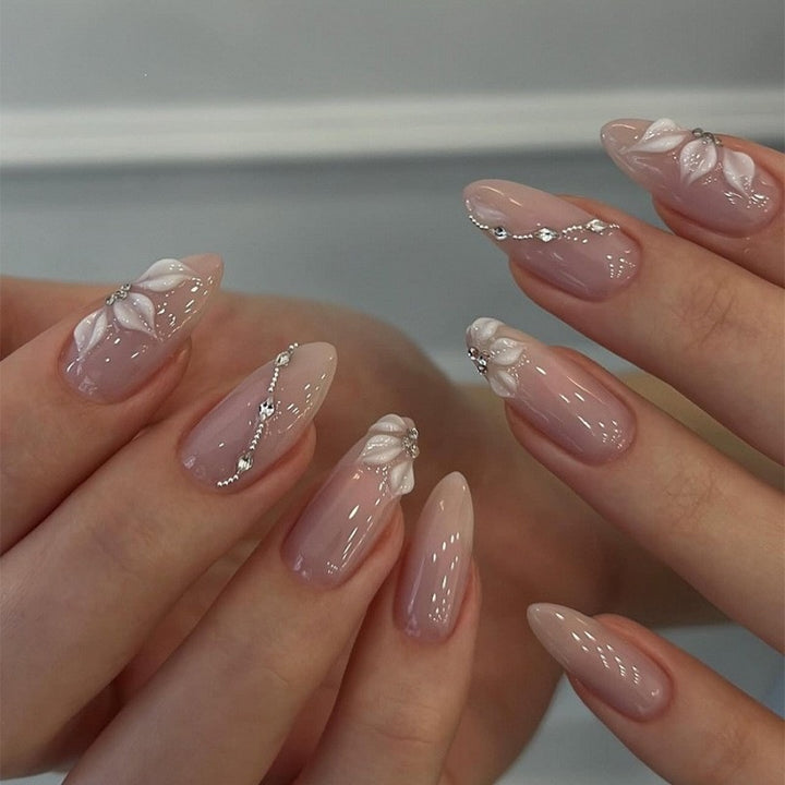 Acrylic nail set with elegant flower and glitter elements Bowlift