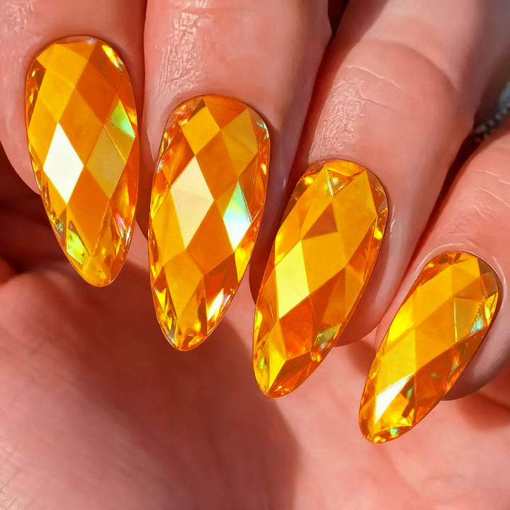 Shiny artificial nails with multifaceted design Bowlift