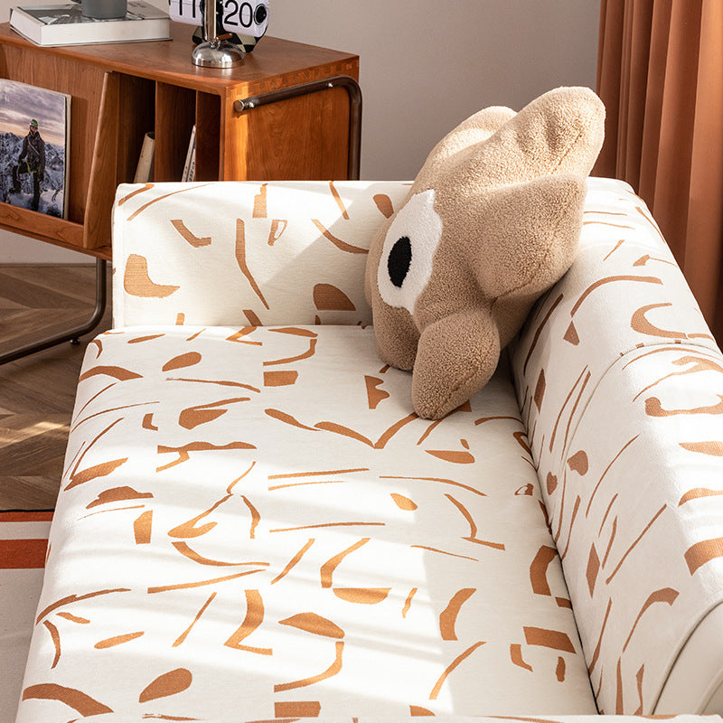 Stretch sofa cover with abstract brushstroke print and elastic waistband Bowlift