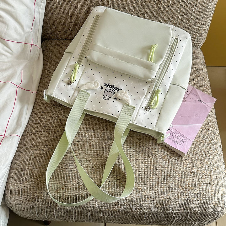 Stylish Dot-Printed Backpack with Decorative Accents Bowlift