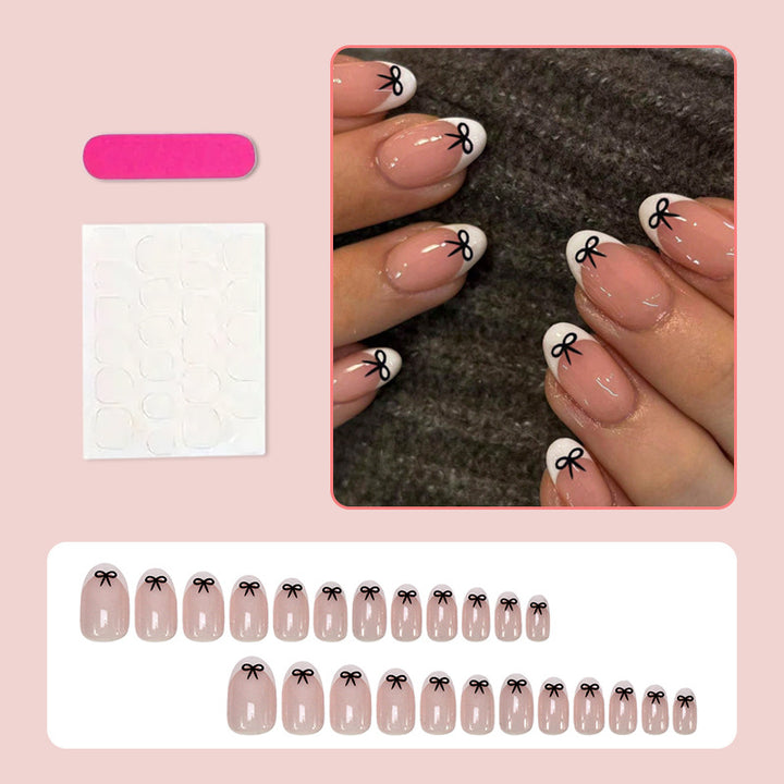 Acrylic nail set with playful bow design Bowlift