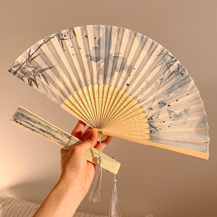 Handcrafted fan with elegant butterfly design Bowlift