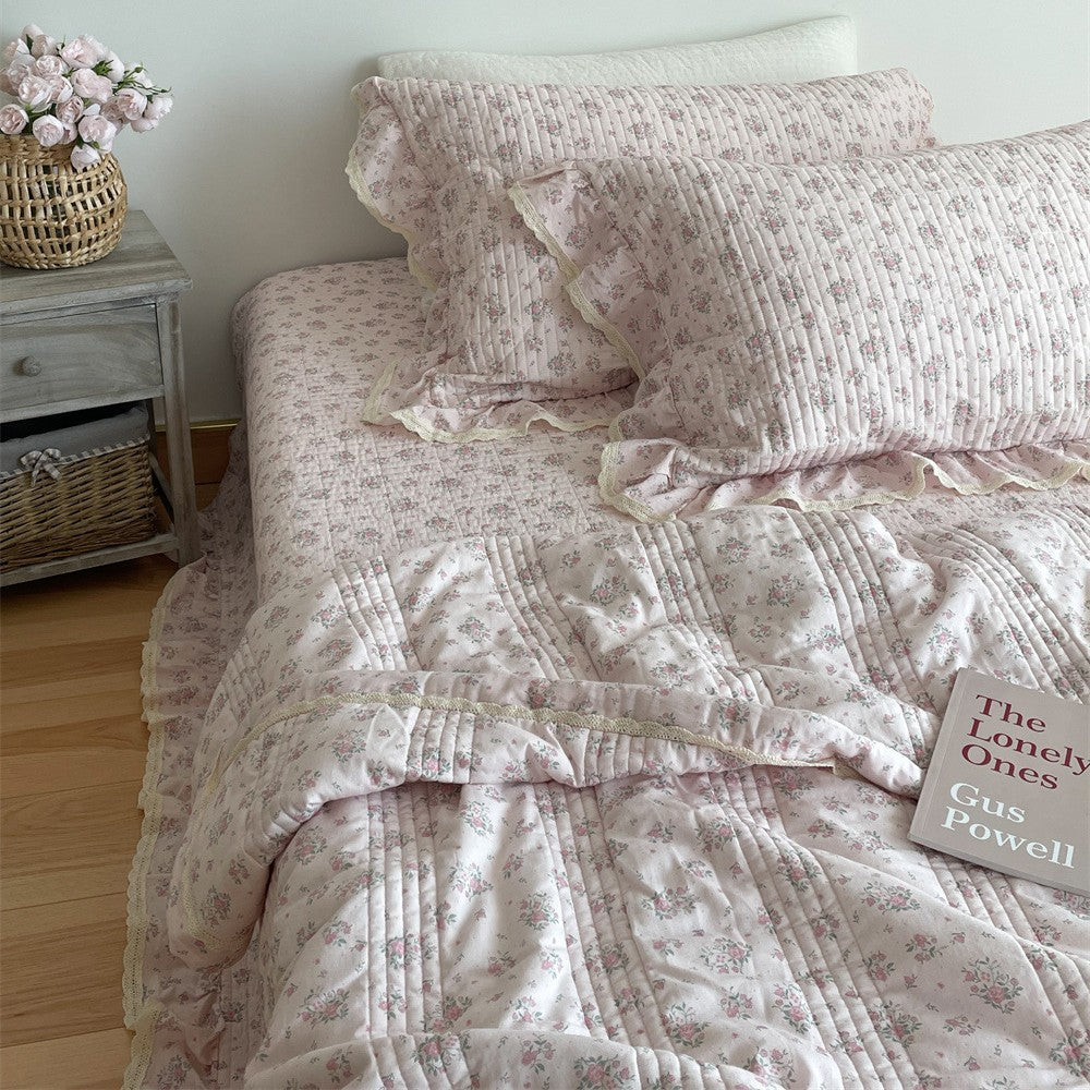 Quilted cotton bedspread set with ruffles and floral vintage pattern