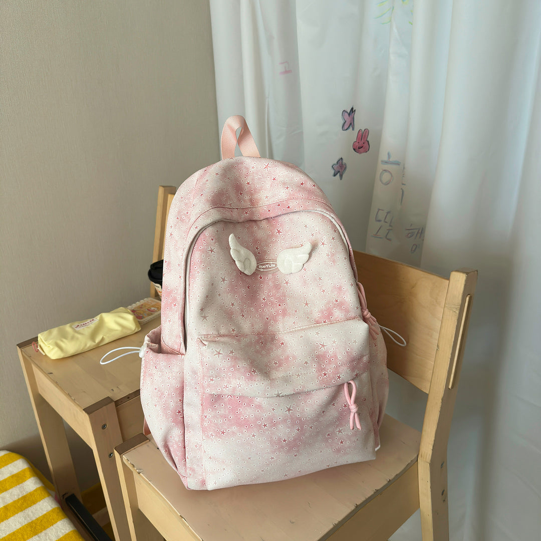 Functional Backpack with Decorative Wing Accents Bowlift