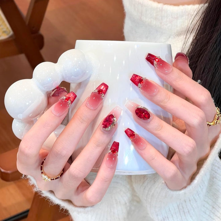 Artistic Stiletto Nail Enhancements with Decorative Accents