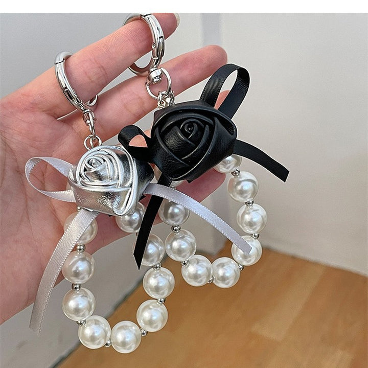 Elegant Pearl and Leather Charm Keychain Bowlift