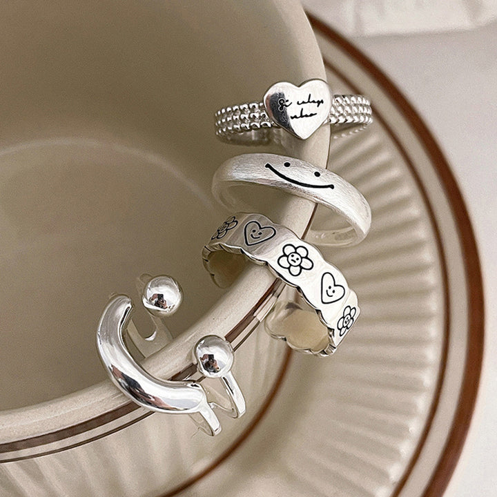 Adjustable Silver Floral Pattern Ring Bowlift