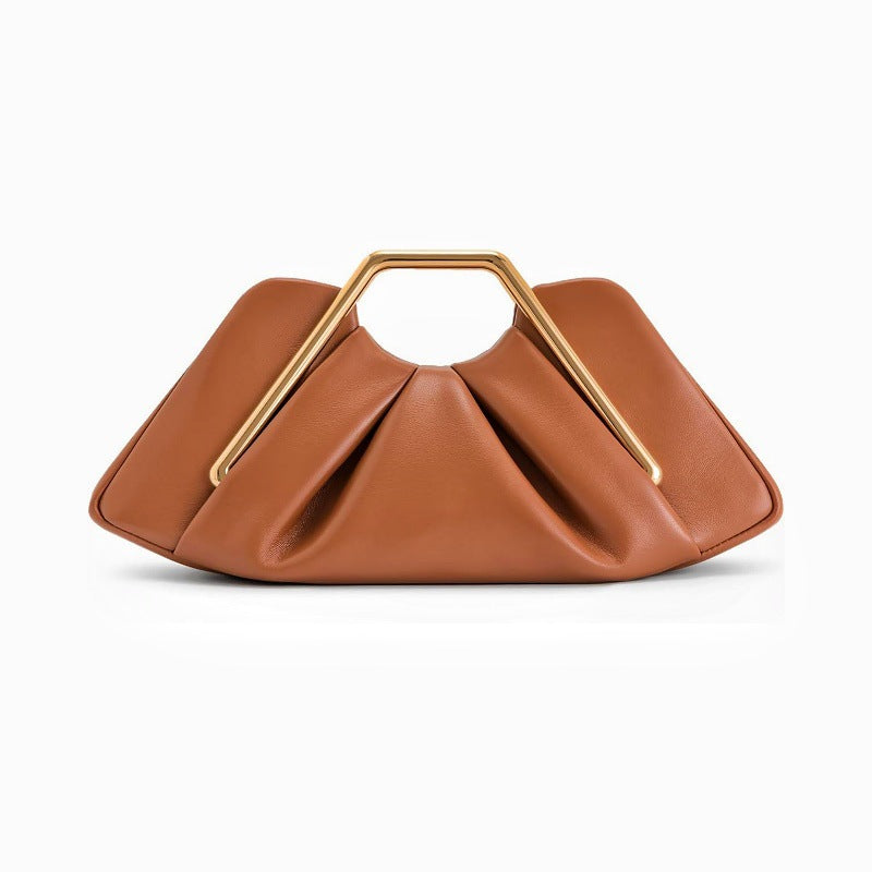Designer handbag with unique handle Bowlift