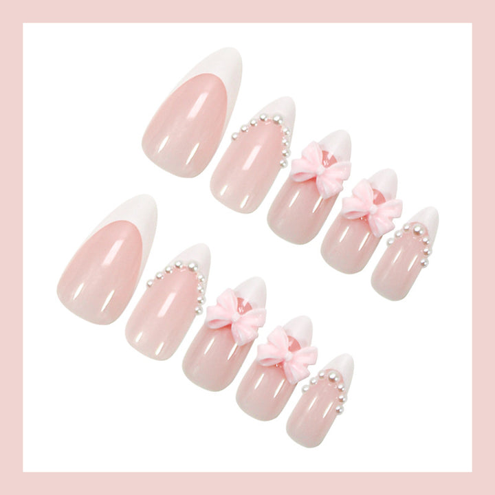Artificial nail set with elegant bow and pearl decorations Bowlift