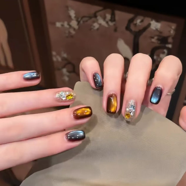 Artistic Ombre Nail Extensions with Metallic Accents