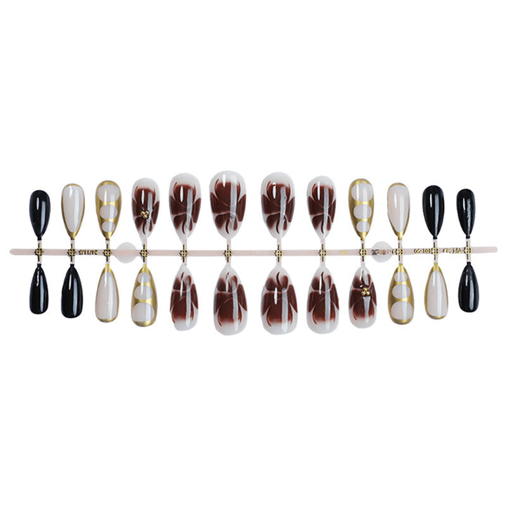 Acrylic nail set with elegant floral accents and luxurious details Bowlift