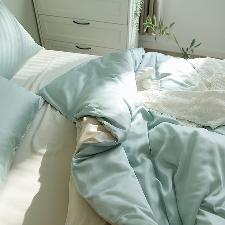 Fine-structured satin bedding set with temperature-regulating fiber and concealed zipper