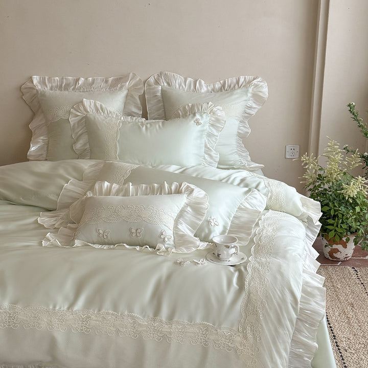 Luxurious satin bedding set with lace trim and ruffles