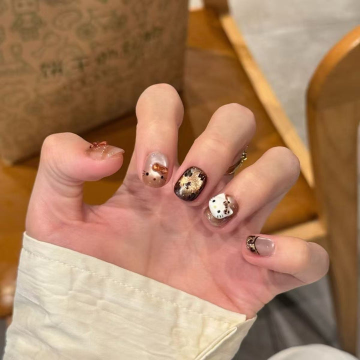 Playful animal motif artificial nails