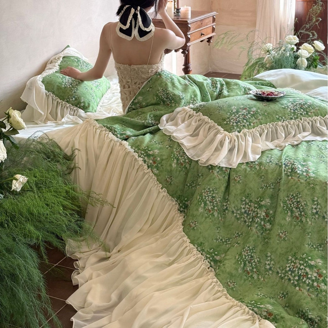 Romantic bed linen set with ruffled hem and floral lightweight fabric look