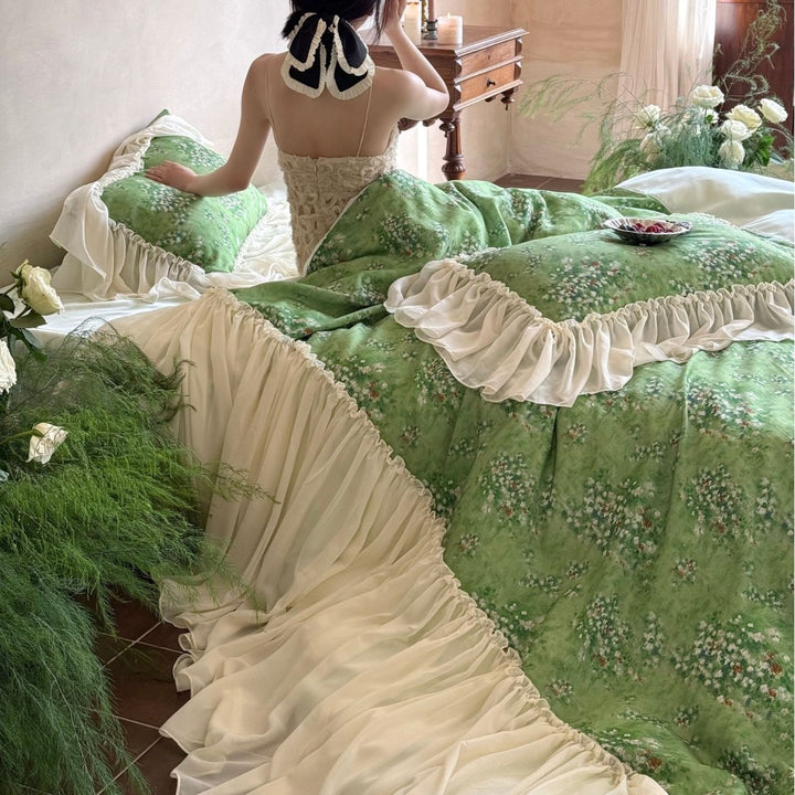 Romantic bed linen set with ruffled hem and floral lightweight fabric look