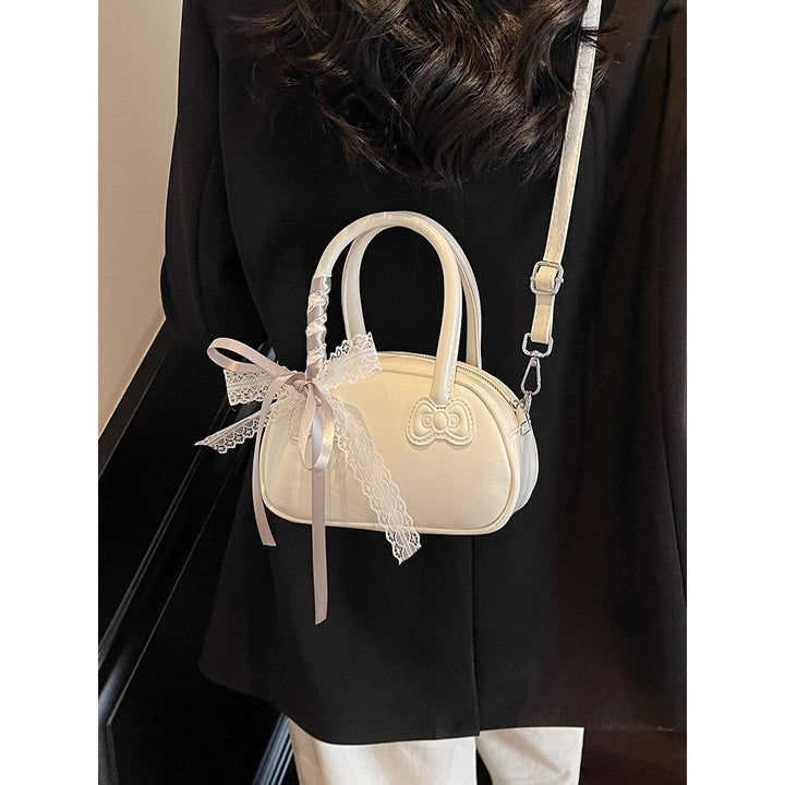 Elegant Bow-Detail Handheld Satchel Bowlift