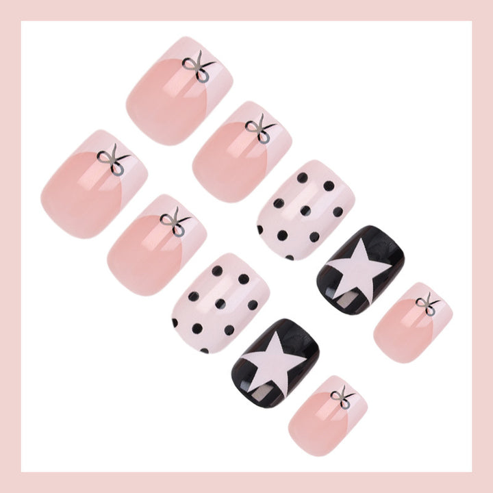 Acrylic nail set with playful dots and star motifs Bowlift