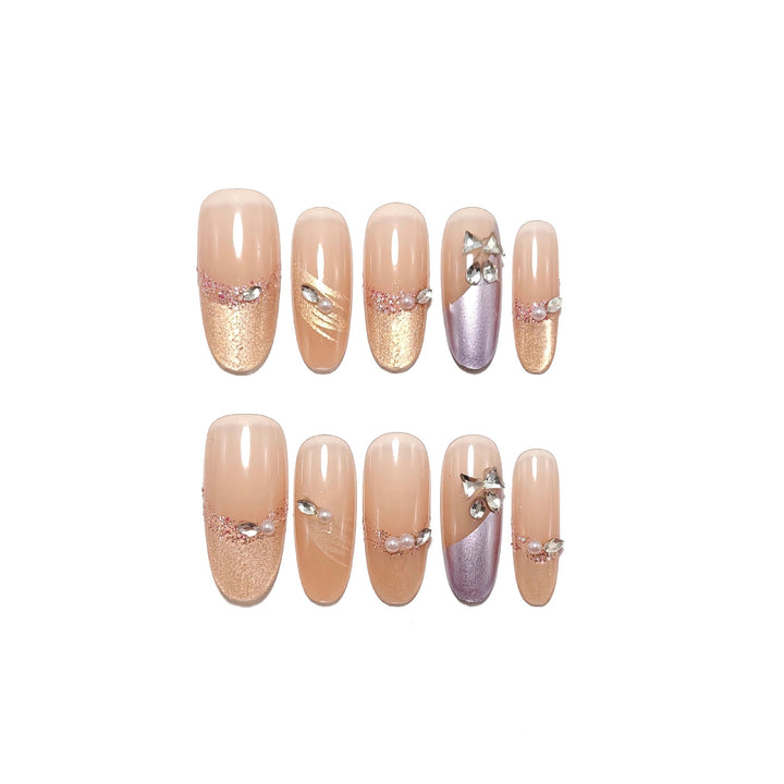 Glamorous artificial nails with rhinestone applications Bowlift