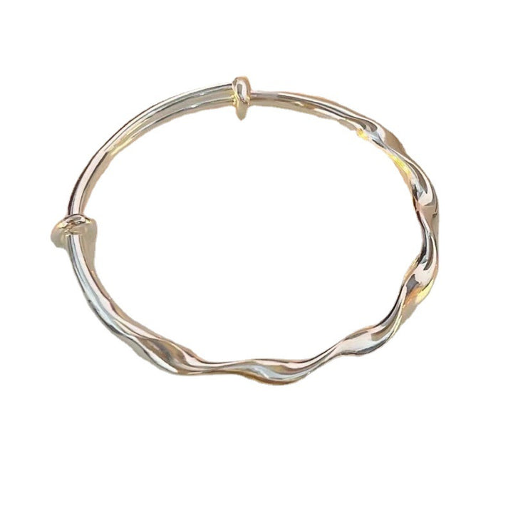 Fashion-forward Twisted Metal Bangle Bracelet Bowlift