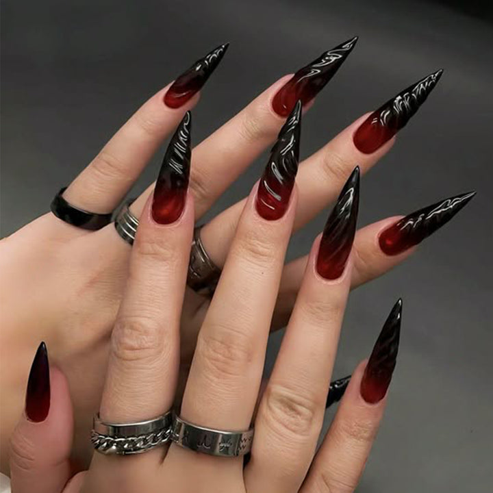 Artistic Stiletto Press-On Nails with Dramatic Ombre Effect Bowlift