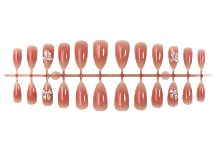Nail set with elegant ombre effects and sparkling accents Bowlift