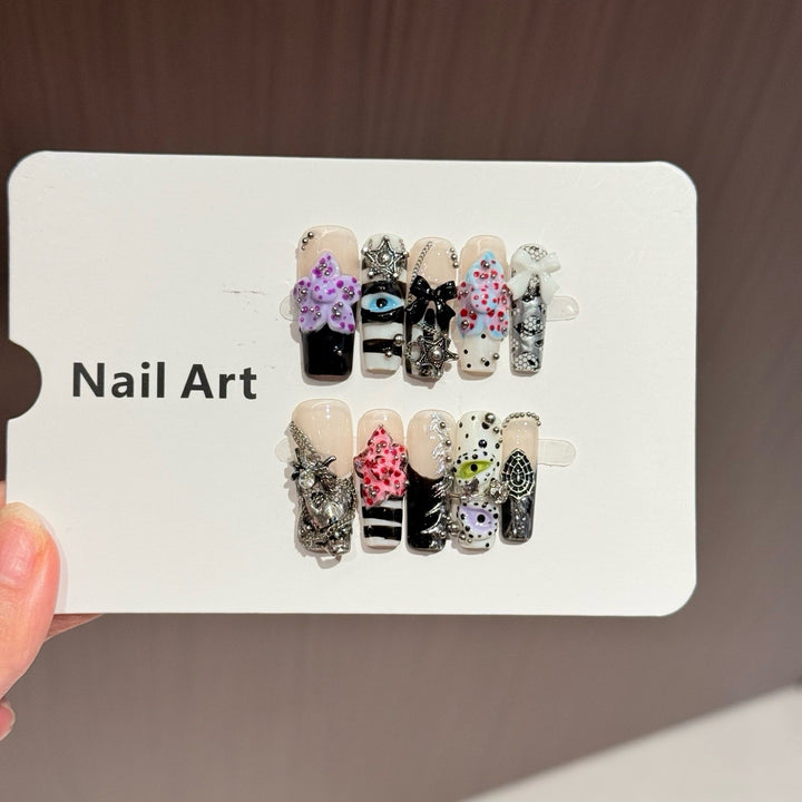 Artistic Press-On Nail Set with Unique Design Elements