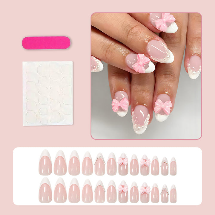 Artificial nail set with elegant bow and pearl decorations Bowlift
