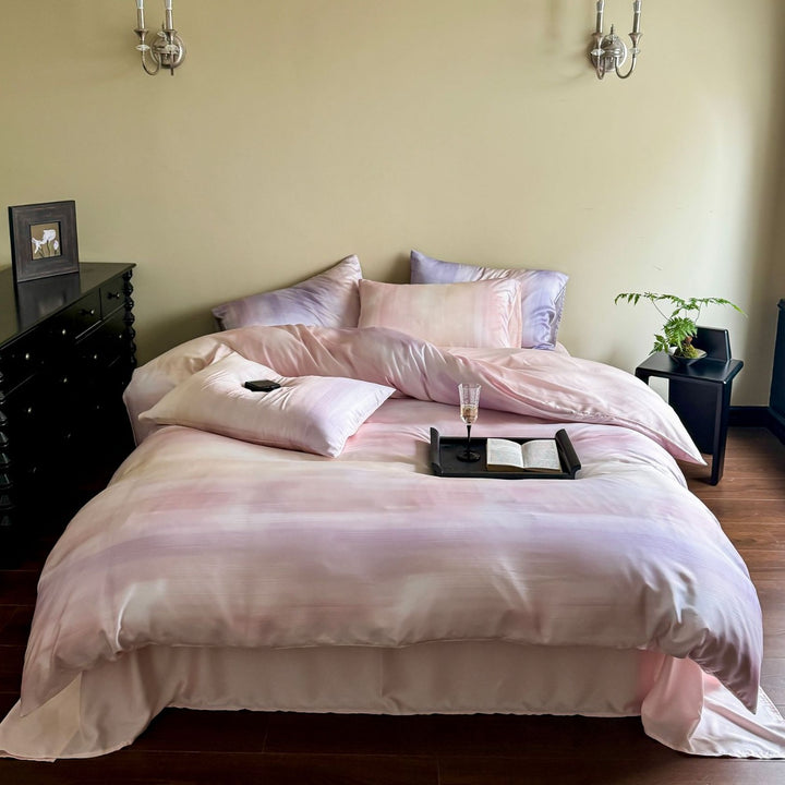 Luxurious Mako satin bedding set with gentle watercolor gradient and concealed hotel closure
